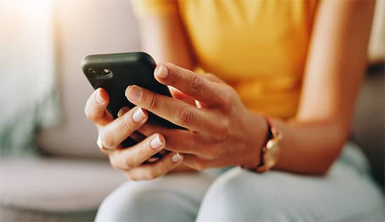 hands holding phone